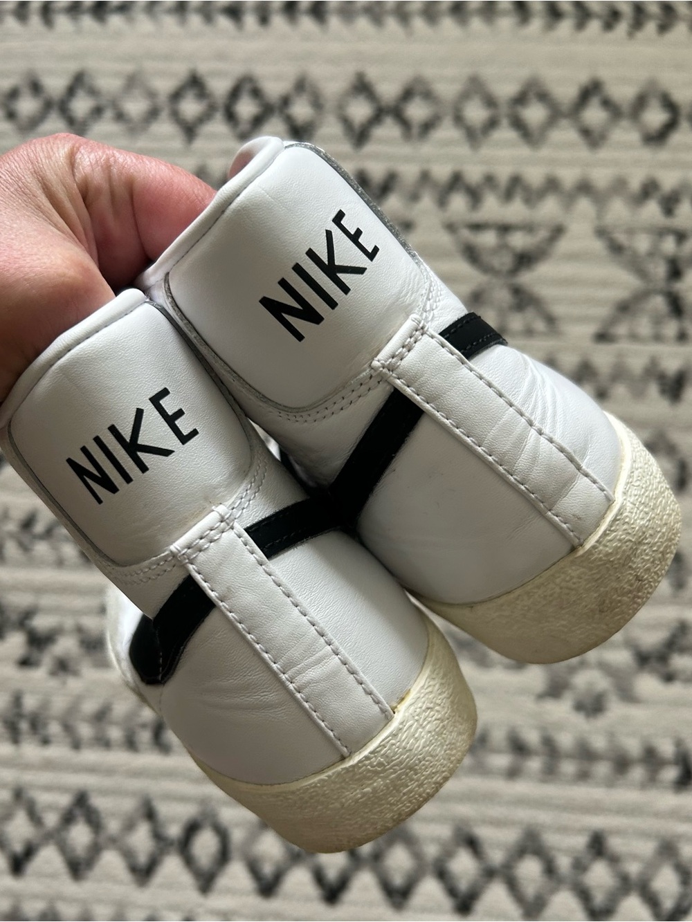 Nike White High-Top Sneakers with Black Swoosh - Picture 3 of 4